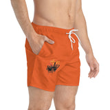 Men's Orange Swim Trunks with Sunset Cityscape Graphic